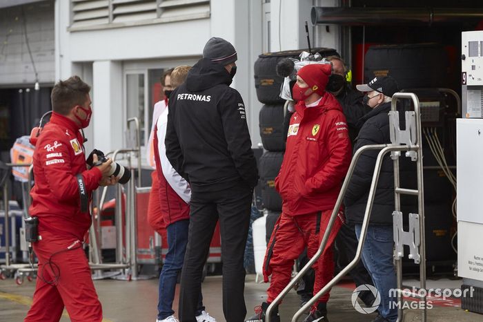 Sebastian Vettel, Ferrari y Toto Wolff, Mercedes