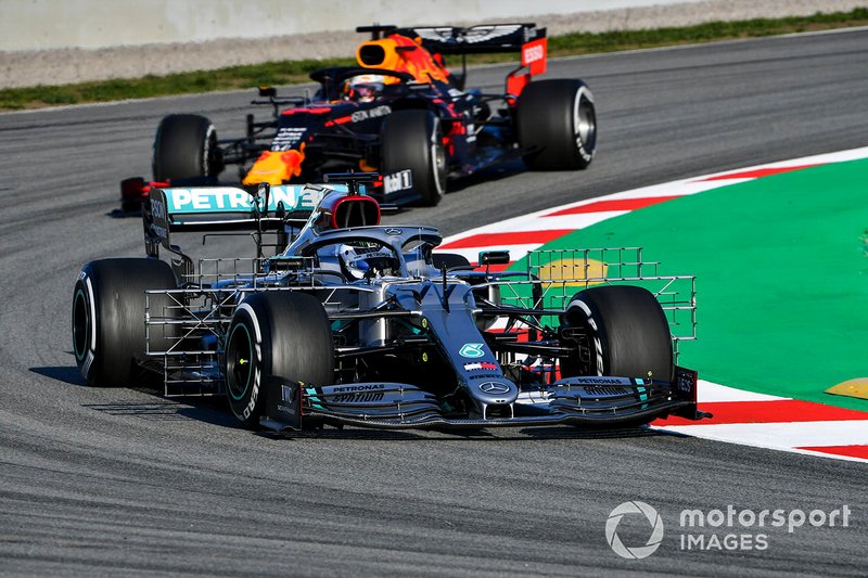 Valtteri Bottas, Mercedes F1 W11 and Max Verstappen, Red Bull Racing