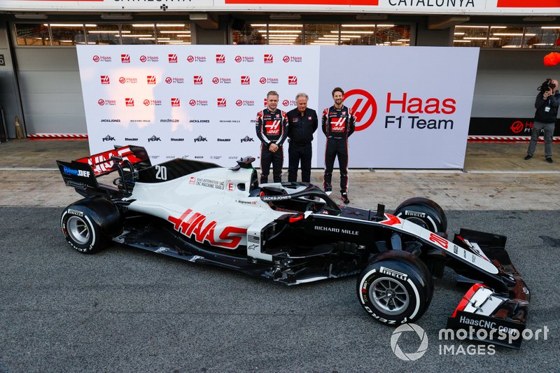 Kevin Magnussen, Haas F1 Team and Romain Grosjean, Haas F1 Team reveal the VF-20 with Gene Haas, Owner and Founder, Haas F1 Team