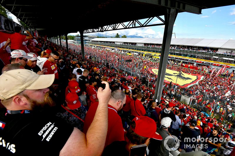 The track becomes a sea of Ferrari fans after the race