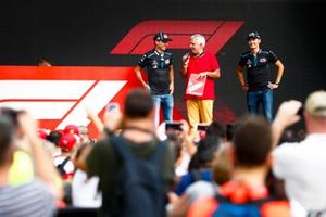 Robert Kubica, Williams Racing and George Russell, Williams Racing on stage in the fan zone