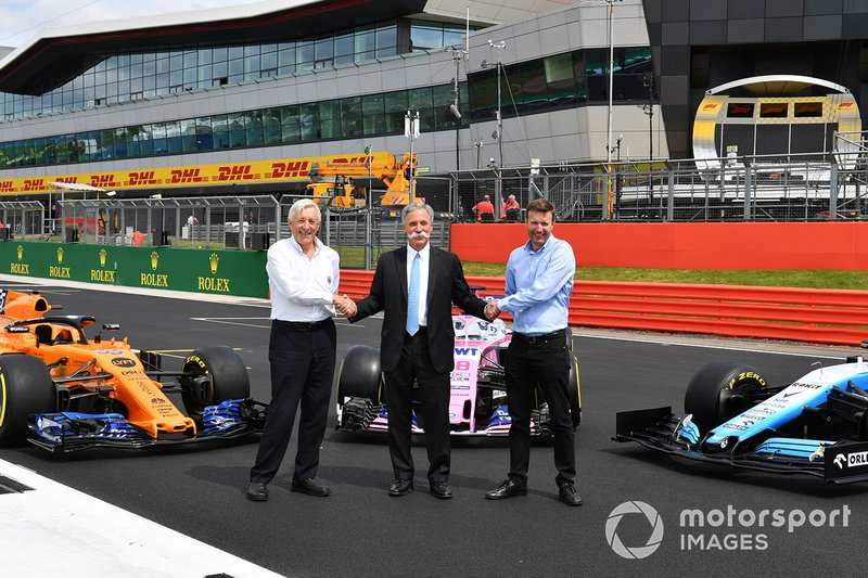 John Grant, Chairman of the BRDC, Chase Carey, Chairman, Formula 1 and Stuart Pringle, Managing Director of Silverstone Circuits with the McLaren MCL34, Racing Point RP19 and Williams Racing FW42 in front of the Silverstone Wing