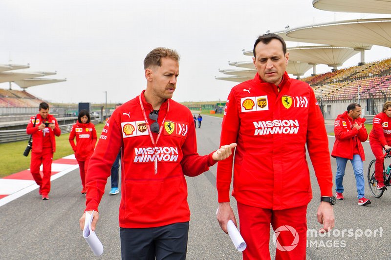 Sebastian Vettel, Ferrari walks the track with his team