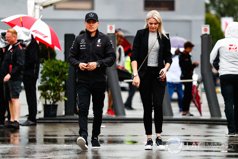 Valtteri Bottas, Mercedes AMG F1, arrives in the paddock