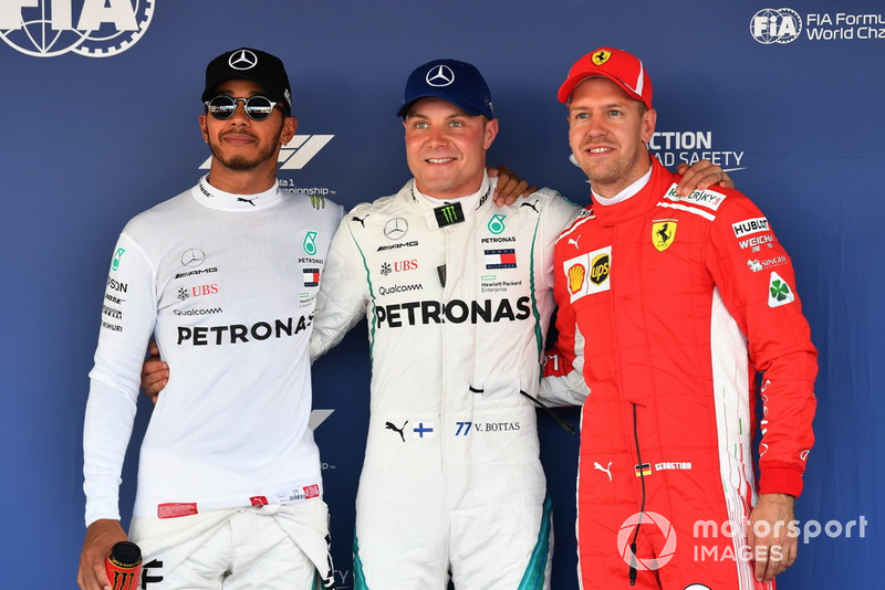Top 3 después de la clasificación, ganador de la pole Valtteri Bottas, Mercedes AMG F1, segundo Lewis Hamilton, Mercedes AMG F1, tercero Sebastian Vettel, Ferrari