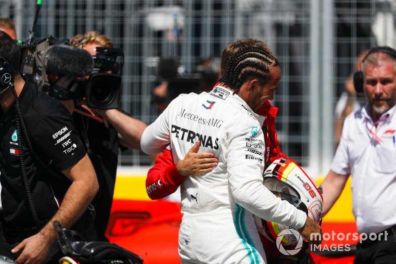 Lewis Hamilton, Mercedes AMG F1, and pole man Sebastian Vettel, Ferrari, after Qualifying