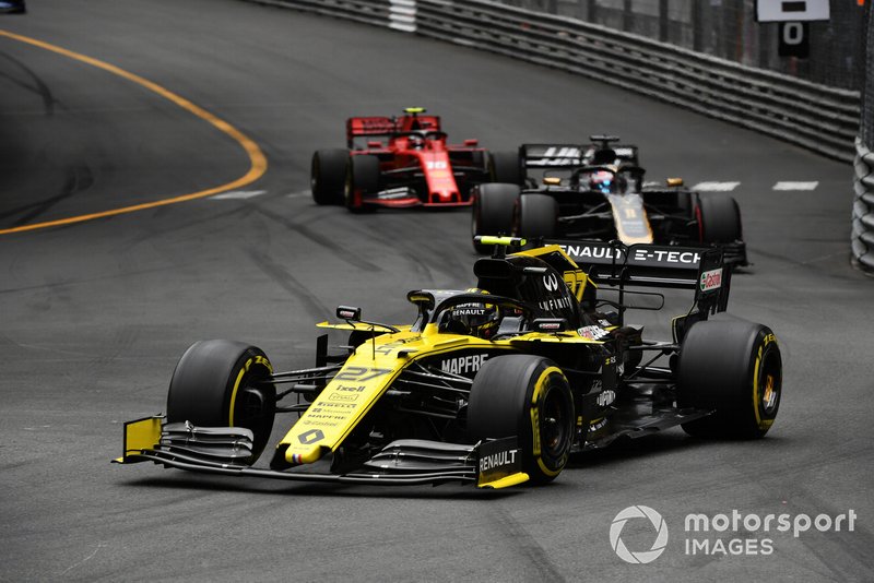 Nico Hulkenberg, Renault R.S. 19, leads Romain Grosjean, Haas F1 Team VF-19, and Charles Leclerc, Ferrari SF90