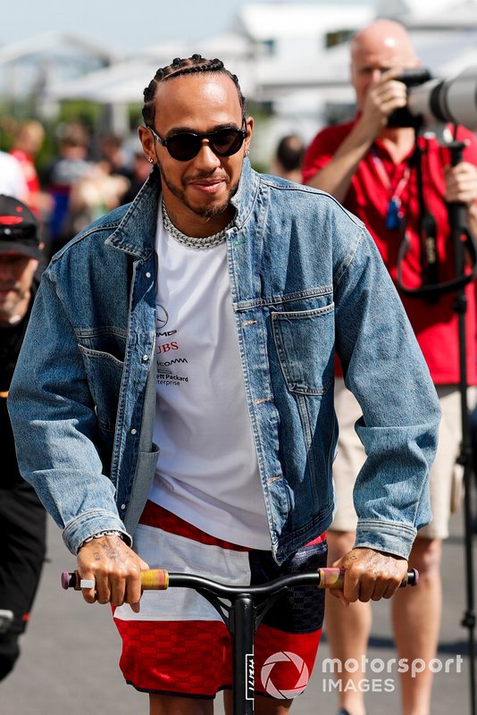 Lewis Hamilton, Mercedes AMG F1 on a scooter in the paddock