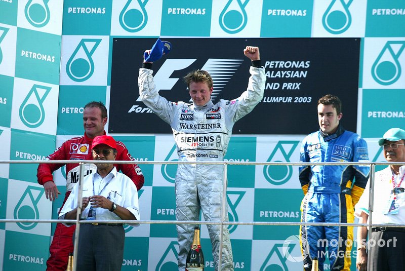 Podium: race winner Kimi Raikkonen, McLaren, second place Rubens Barrichello, Ferrari, third place Fernando Alonso,	Renault