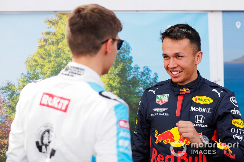 George Russell, Williams Racing, with Alex Albon, Red Bull Racing