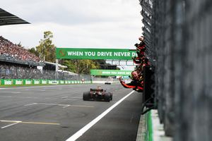 Race Winner Max Verstappen, Red Bull Racing RB14 crosses the line 