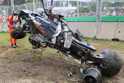 The McLaren MP4-31 of Fernando Alonso, McLaren after his race stopping crash