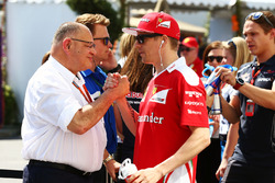 (L to R): Pat Behar, FIA with Kimi Raikkonen, Ferrari on the drivers parade