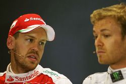 Sebastian Vettel, Ferrari and Nico Rosberg, Mercedes AMG F1 Team in the press conference