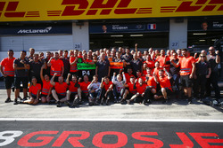 Romain Grosjean, Haas F1 Team, Kevin Magnussen, Haas F1 Team, and the Haas F1 team celebrate the team's best finish to date