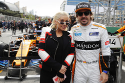 Singer Christina Aguilera with Fernando Alonso, McLaren, on the grid