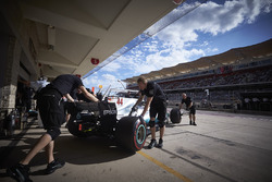 Lewis Hamilton, Mercedes AMG F1 W08, is returned to the garage