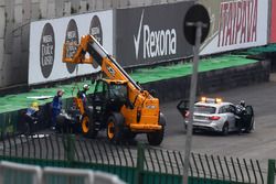 The crashed car of Lewis Hamilton, Mercedes-Benz F1 W08  is recovered in Q1