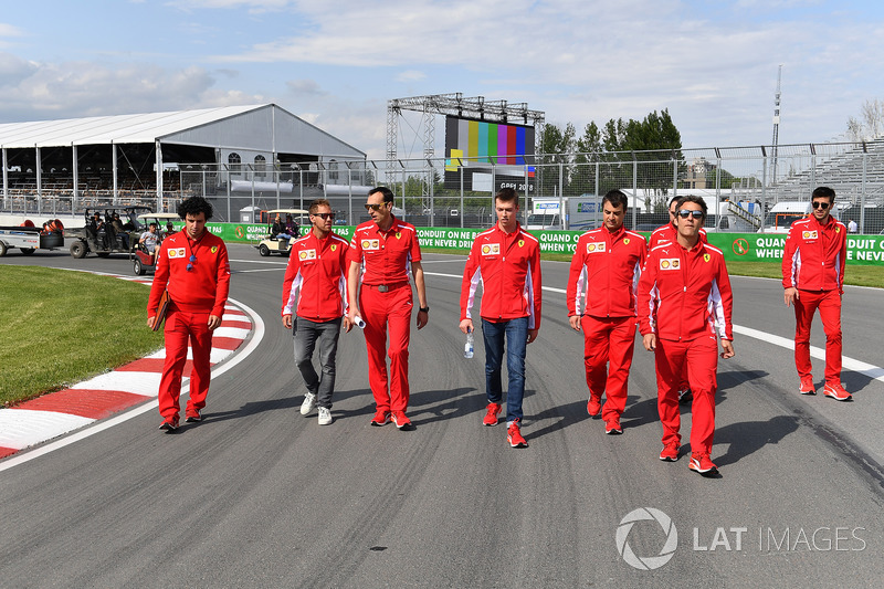 Sebastian Vettel, Ferrari and Daniil Kvyat, Ferrari walk the track
