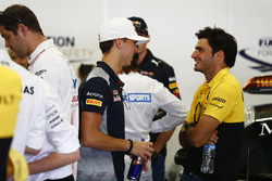Pierre Gasly, Scuderia Toro Rosso, talks with Carlos Sainz Jr., Renault Sport F1 Team