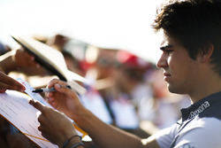 Lance Stroll, Williams Racing, signs an autograph for fans