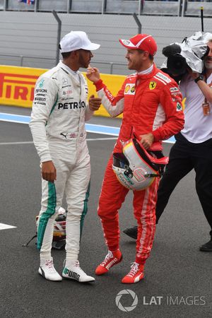 Lewis Hamilton, Mercedes-AMG F1 and Sebastian Vettel, Ferrari celebrate in parc ferme