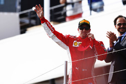 Kimi Raikkonen, Ferrari, festeggia sul podio