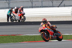 Marc Marquez, Repsol Honda Team, Dovizioso after crashing in background