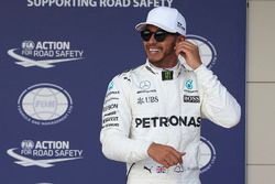 Polesitter Lewis Hamilton, Mercedes AMG F1, celebrates