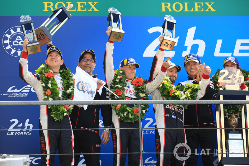 Overall podium: second place Mike Conway, Kamui Kobayashi, Jose Maria Lopez, Toyota Gazoo Racing
