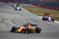 Fernando Alonso, McLaren MCL33, leads Esteban Ocon, Force India VJM11