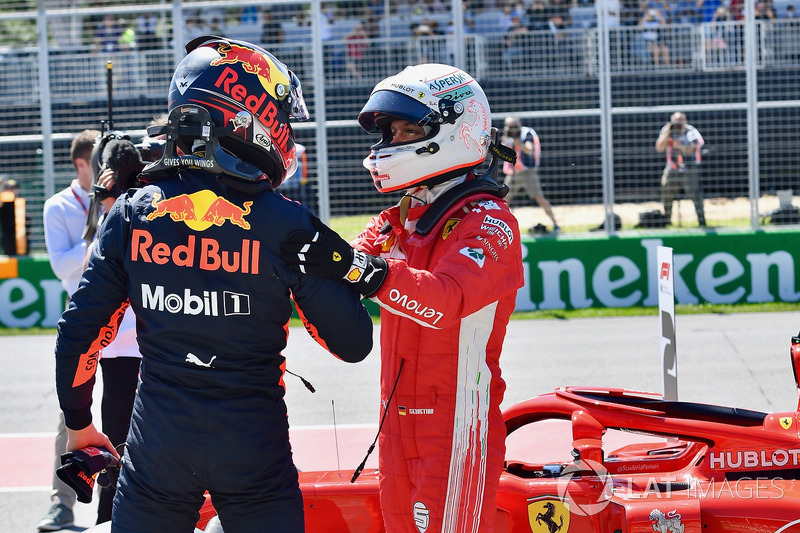 Pole sitter Sebastian Vettel, Ferrari celebrates in parc ferme with Max Verstappen, Red Bull Racing