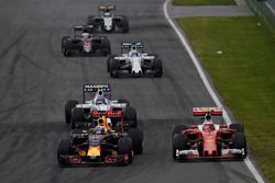 Max Verstappen, Red Bull Racing RB12 and Kimi Raikkonen, Ferrari SF16-H battle for position