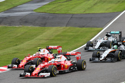 Sebastian Vettel, Ferrari SF16-H and team mate Kimi Raikkonen, Ferrari SF16-H battle for position