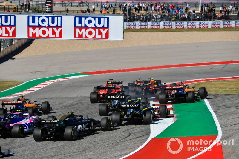 Valtteri Bottas, Mercedes AMG W10, leads Max Verstappen, Red Bull Racing RB15, Sebastian Vettel, Ferrari SF90, Lewis Hamilton, Mercedes AMG F1 W10, and Charles Leclerc, Ferrari SF90, as Alex Albon, Red Bull Racing RB15, and Carlos Sainz Jr., McLaren MCL34, make contact at the start