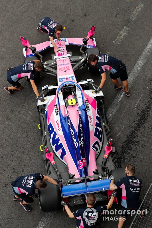 Lance Stroll, Racing Point RP19, is returned to the garage