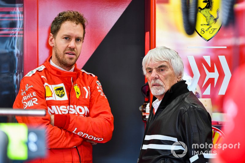 Sebastian Vettel, Ferrari e Bernie Ecclestone, Presidente emerito della Formula 1, nel garage Ferrari