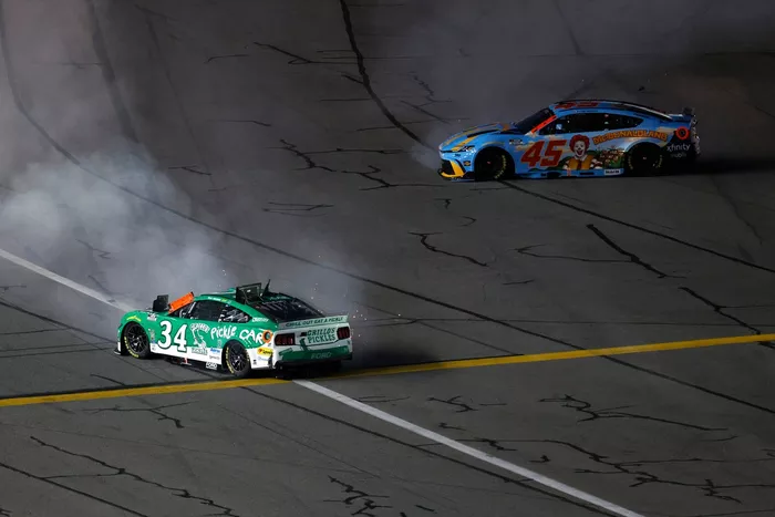 Todd Gilliland, Front Row Motorsports Ford, Tyler Reddick, 23XI Racing Toyota