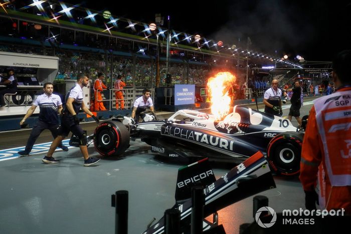 The car of Pierre Gasly, AlphaTauri AT03, catches fire in the pits