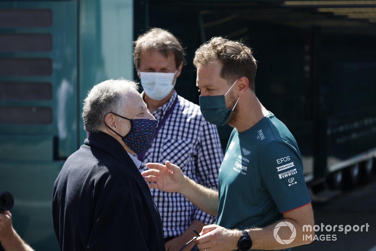 El presidente de la FIA Jean Todt y Sebastian Vettel, Aston Martin