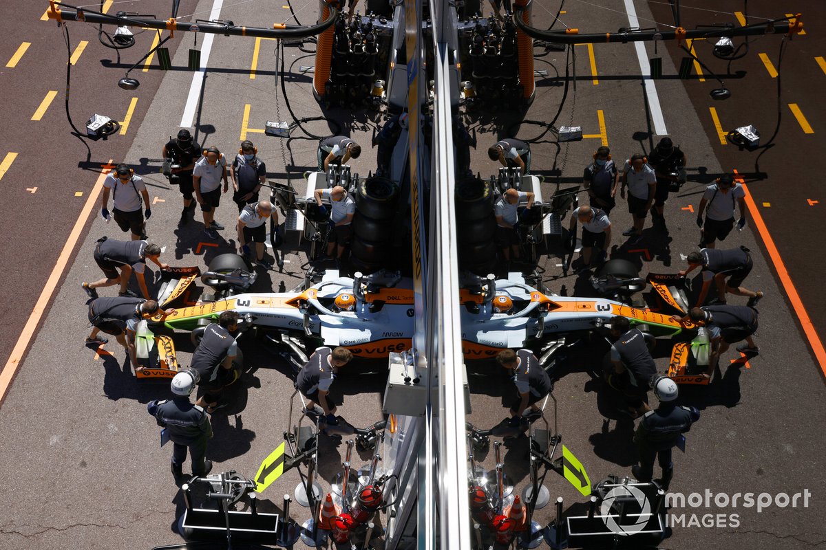 Daniel Ricciardo, McLaren MCL35M, is returned to the garage