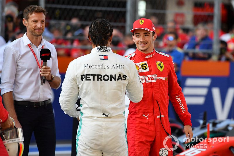 Pole winner Charles Leclerc, Ferrari, is congratulated by Lewis Hamilton, Mercedes AMG F1