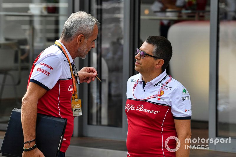 Beat Zehnder, Team Manager, Alfa Romeo Racing, talks to a colleague