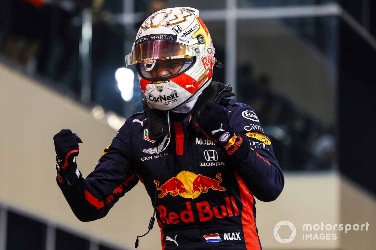 Pembalap Red Bull Racing-Honda, Max Verstappen, merayakan kemenangannya dalam GP Abu Dhabi 2020.