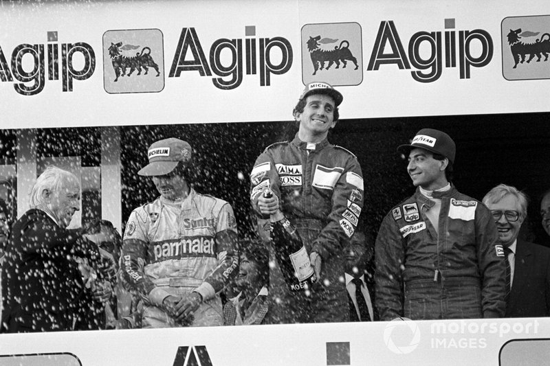 The podium: Nelson Piquet, Brabham third; Alain Prost, McLaren winner; Michele Alboreto, Ferrari second