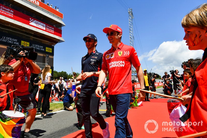 Pierre Gasly, Red Bull Racing, and Charles Leclerc, Ferrari, at the drivers parade