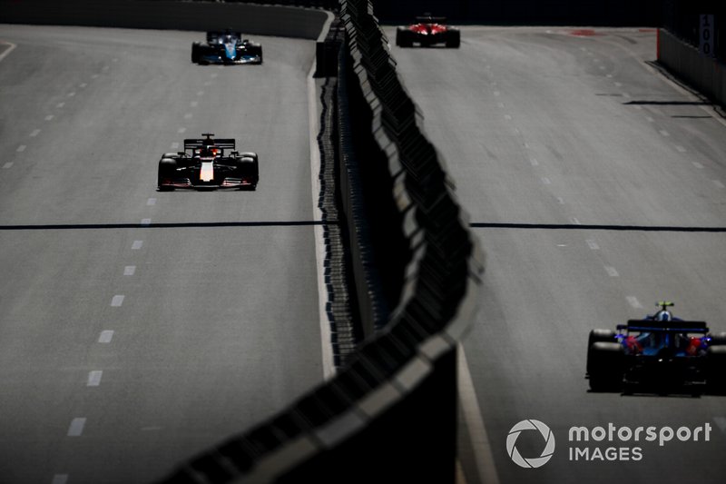Max Verstappen, Red Bull Racing RB15, and Alexander Albon, Toro Rosso STR14
