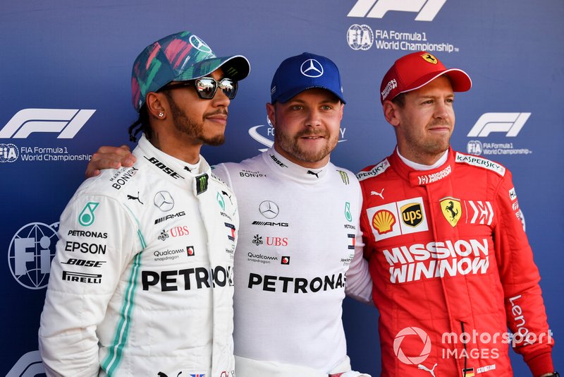 Top three Qualifiers, Lewis Hamilton, Mercedes AMG F1, pole man Valtteri Bottas, Mercedes AMG F1, and Sebastian Vettel, Ferrari