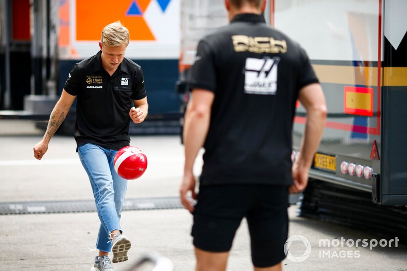 Kevin Magnussen, Haas F1, plays football with a team mate