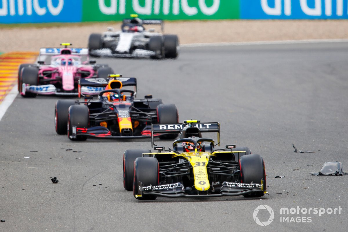 Esteban Ocon, Renault F1 Team R.S.20, Alex Albon, Red Bull Racing RB16, and Lance Stroll, Racing Point RP20, through the debris field left by the crash involving Antonio Giovinazzi, Alfa Romeo Racing C39, and George Russell, Williams FW43